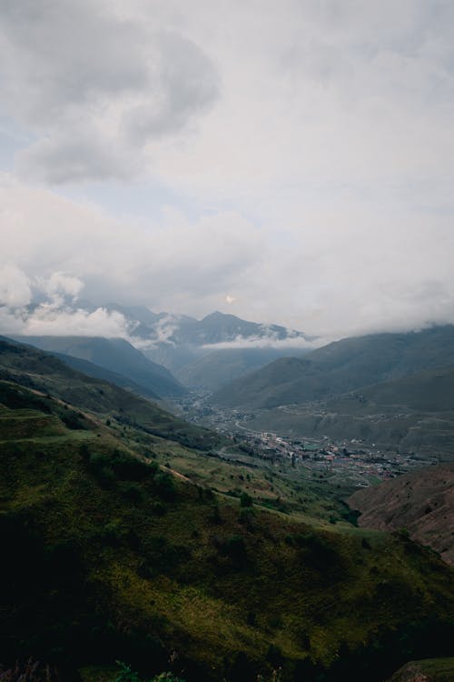 Clouds Floating Over a Mountain Town