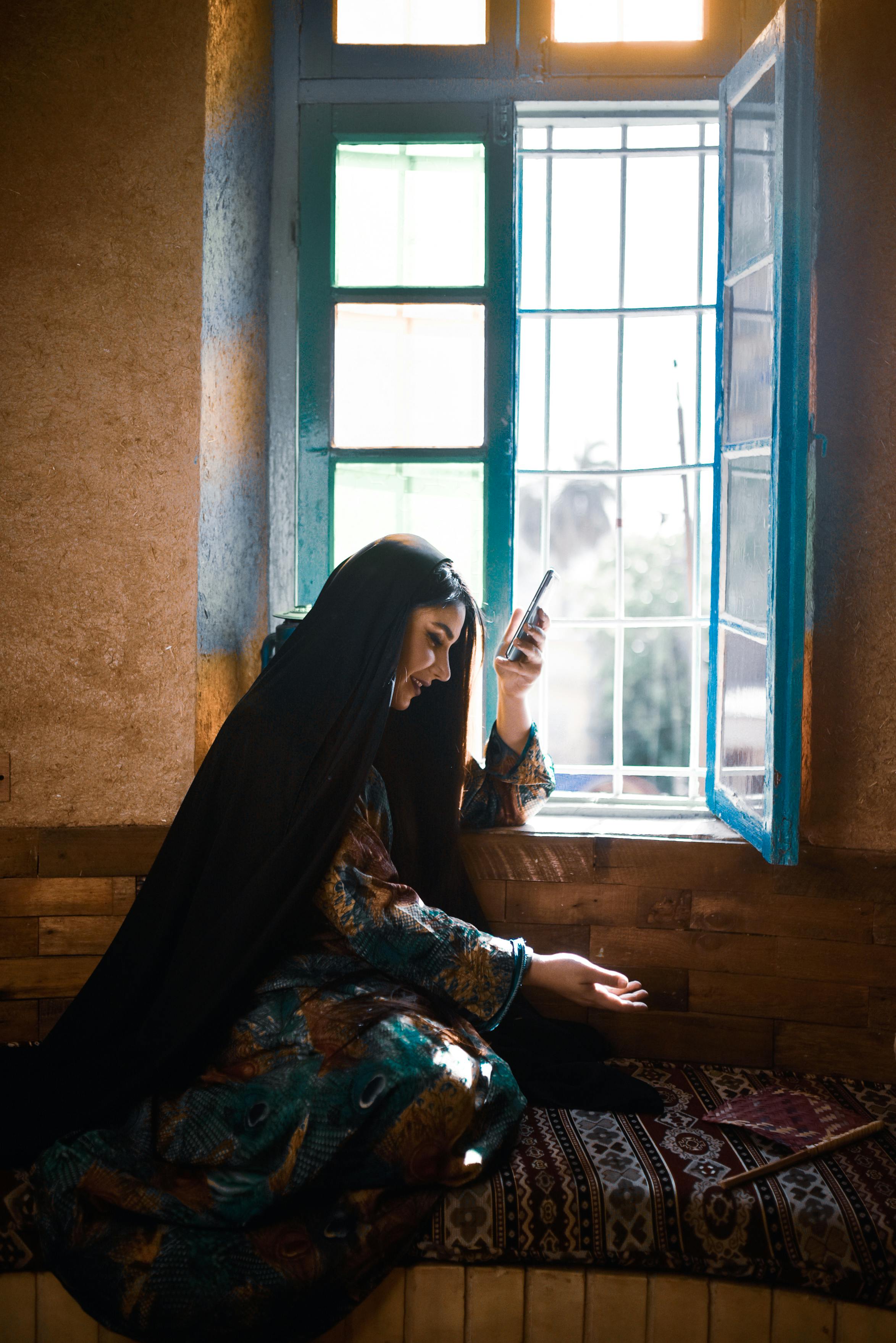 Women Looking at a Cellphone Laughing · Free Stock Photo Women Looking at a Cellphone Laughing · Free Stock Photo