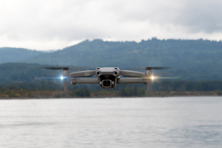 Drone Hovering Over A Lake