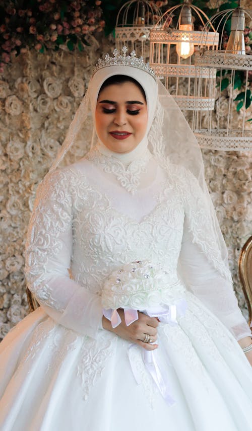 An Elegant Woman in White Wedding Dress