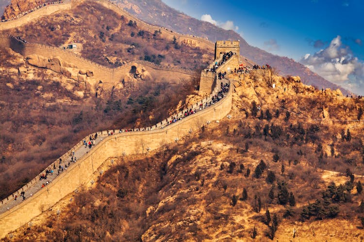 People Visiting The Great Wall Of China