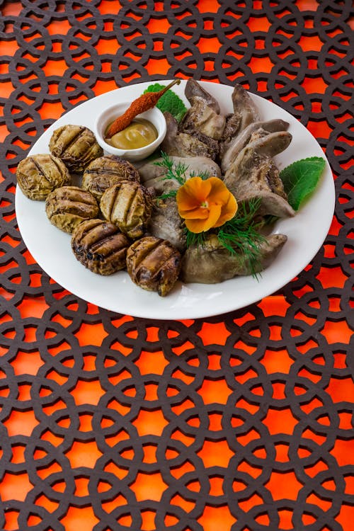 Close-Up Shot of Cooked Meat on a Plate