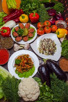 A colorful assortment of fresh vegetables and delicious homemade dishes displayed on a table.