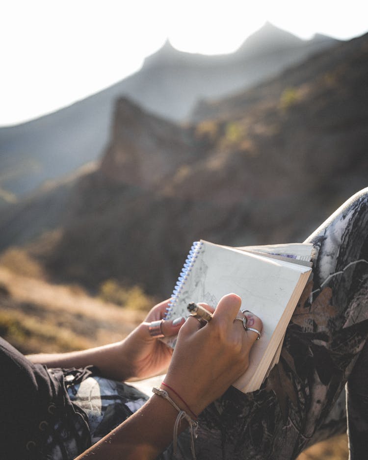 Person Drawing Sketch Outside