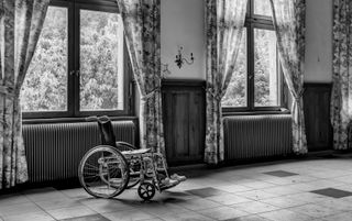 A wheelchair in a bright room