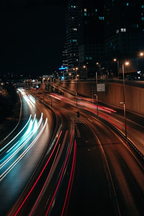 Time-Lapse Photo of Vehicles on the Road at Night