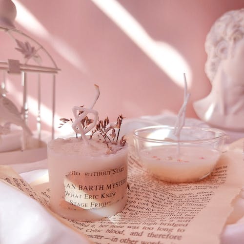 Close-Up Shot of Pink Scented Candles