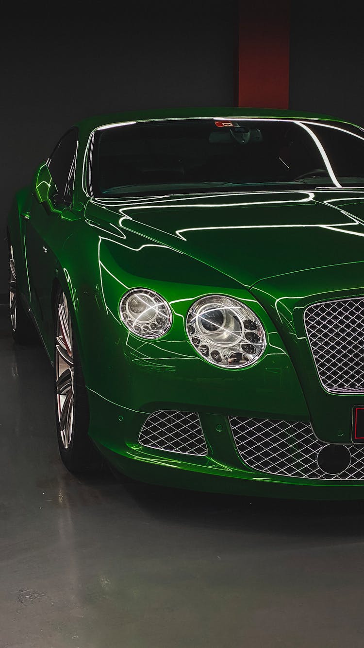 A Green Sports Car Parked In The Garage