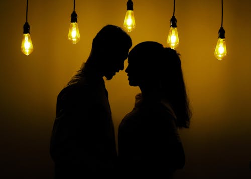 Silhouette of a Romantic Couple Kissing