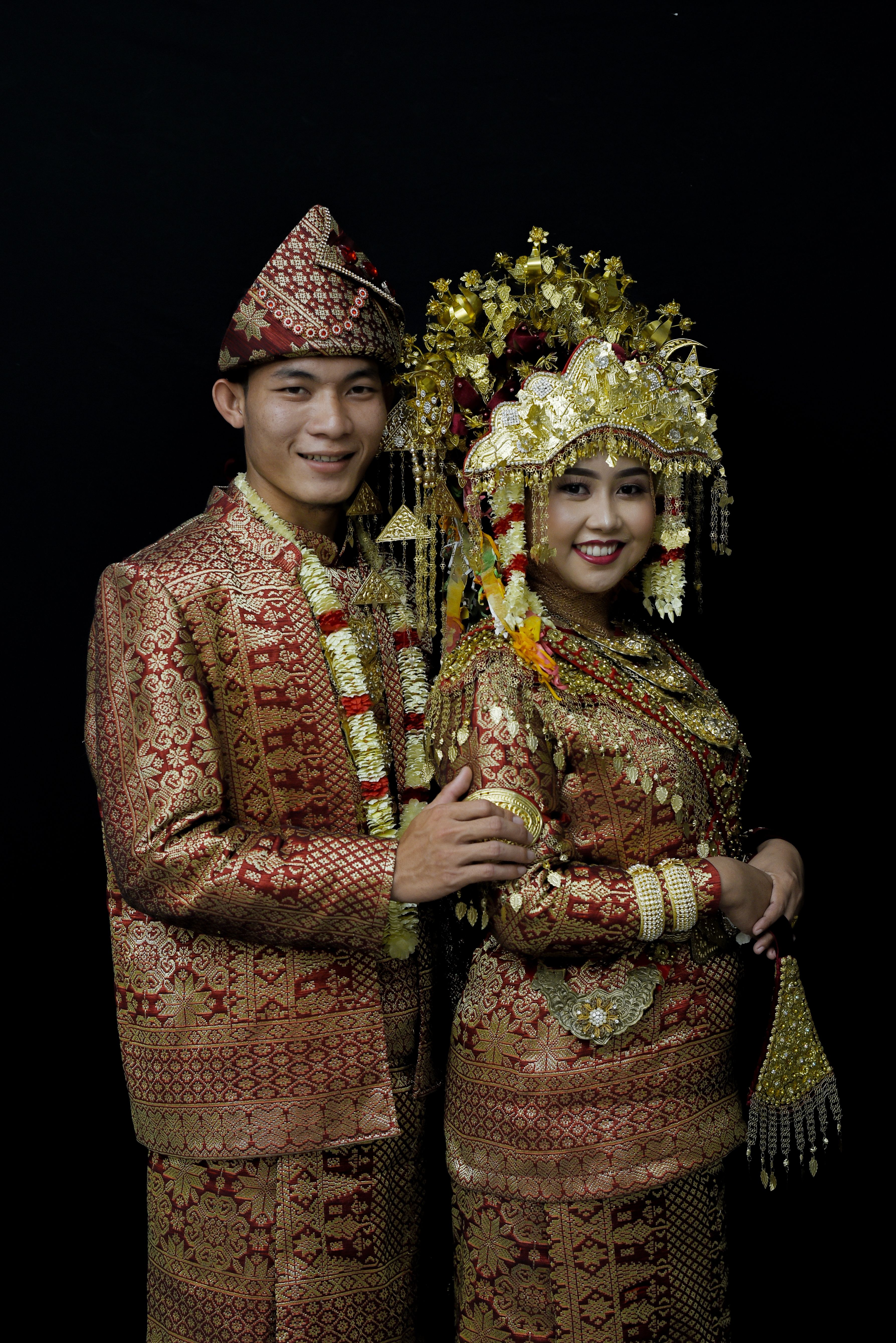 A Couple in Gold Traditional Clothes · Free Stock Photo