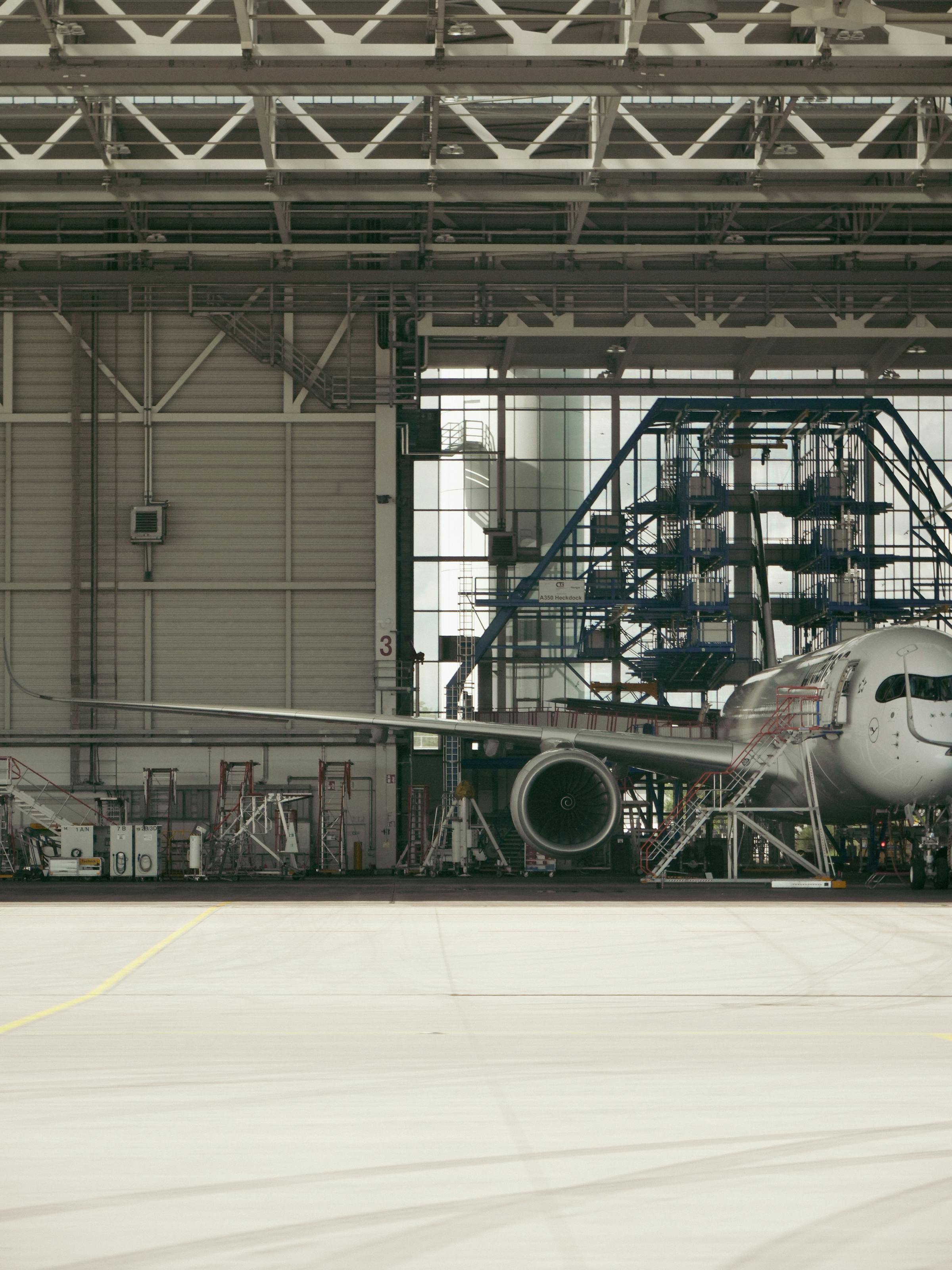 Aircraft under maintenance in hangar