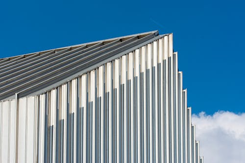 Corrugated Metal Building Under Blue Sky