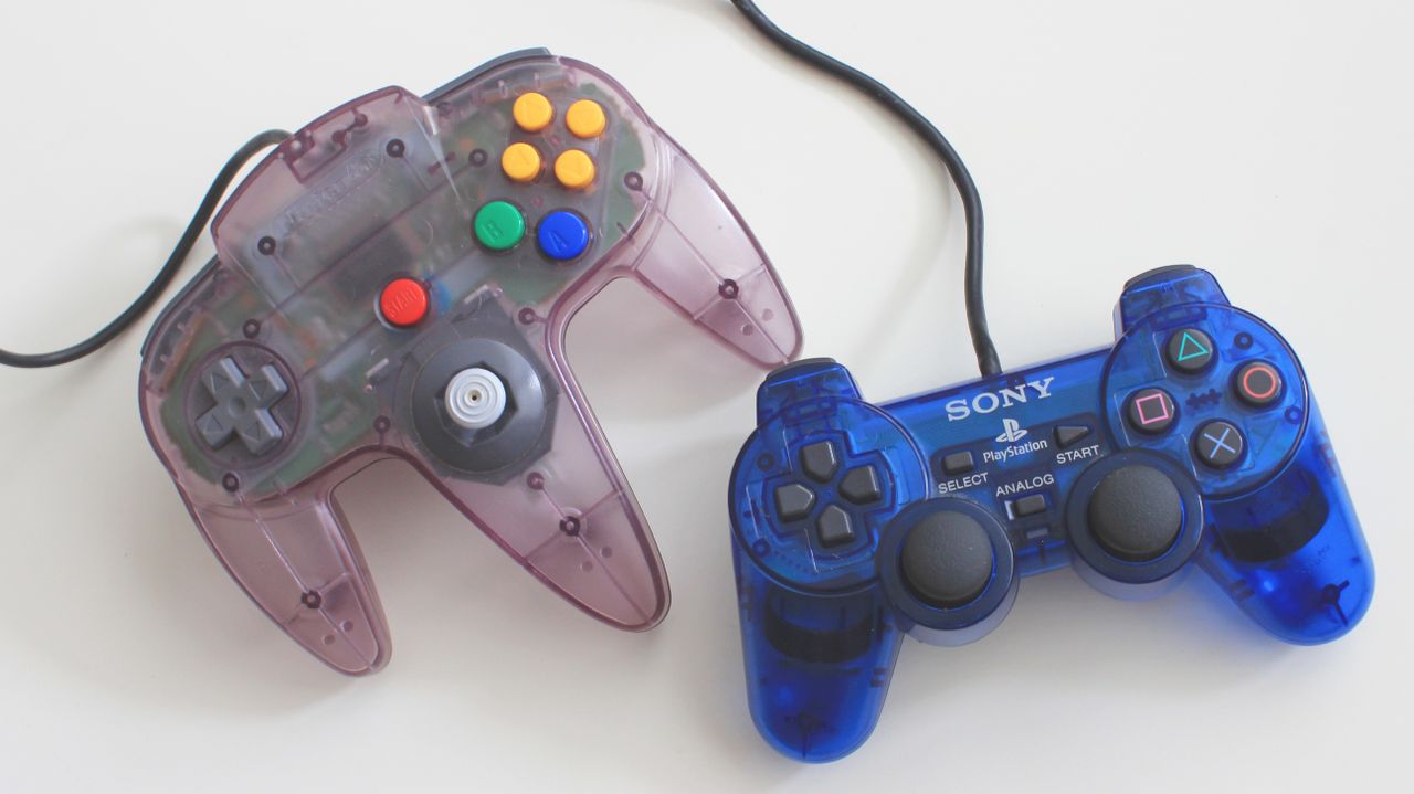 two translucent gaming controllers sony playstation and nintendo on a