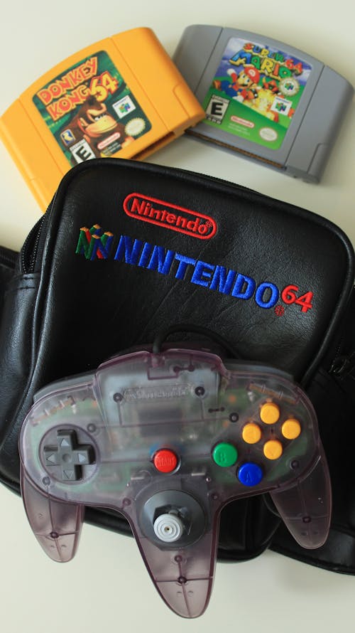 Free Vintage Nintendo Video Games Cartridge and Controller  Stock Photo