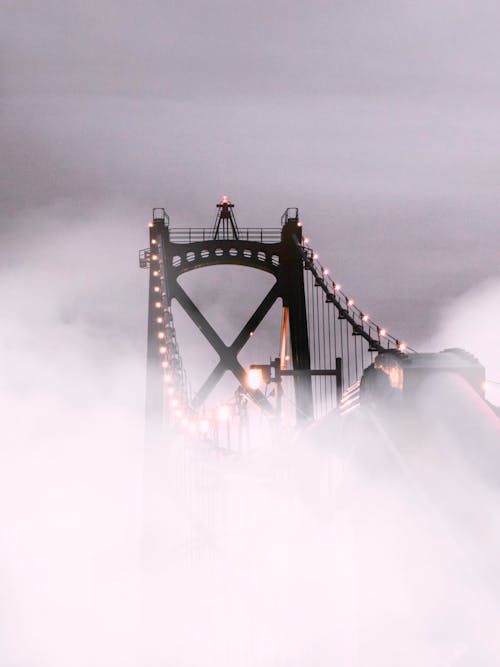 Suspension Bridge Covered With Fog