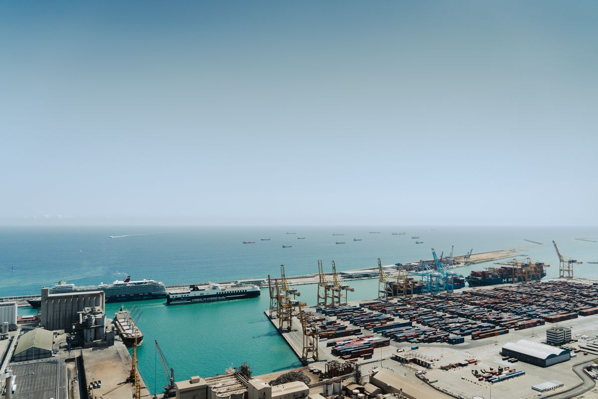 Aerial view of a busy corridor terminal with docked ships
