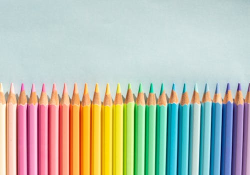 Close-up of Colour Coordinated Pencils in a Row 