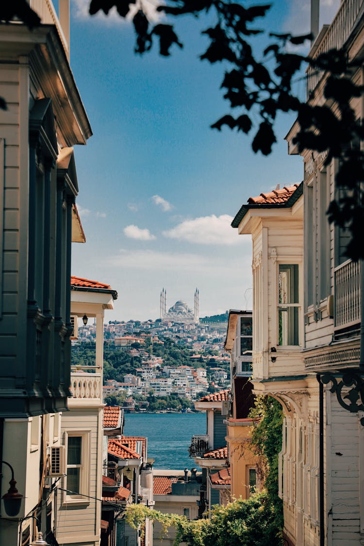 View Of A Mosque Between Buildings On The Hill In Istanbul, Turkey 