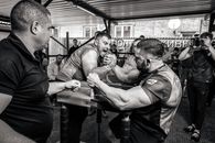 Men Fighting in Arm Wrestling