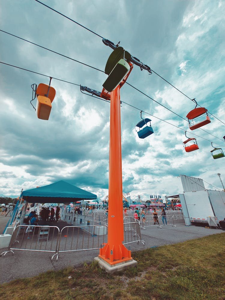 Empty Ski Lift Under Clouds