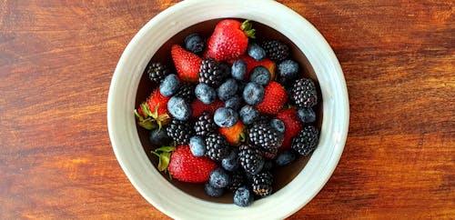 Variety of Berries in White Ceramic Bowl