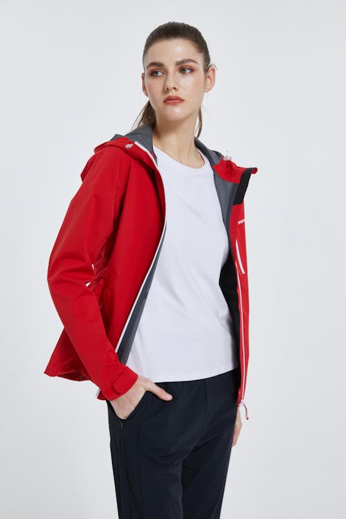 A Young Woman Posing in a Red Jacket