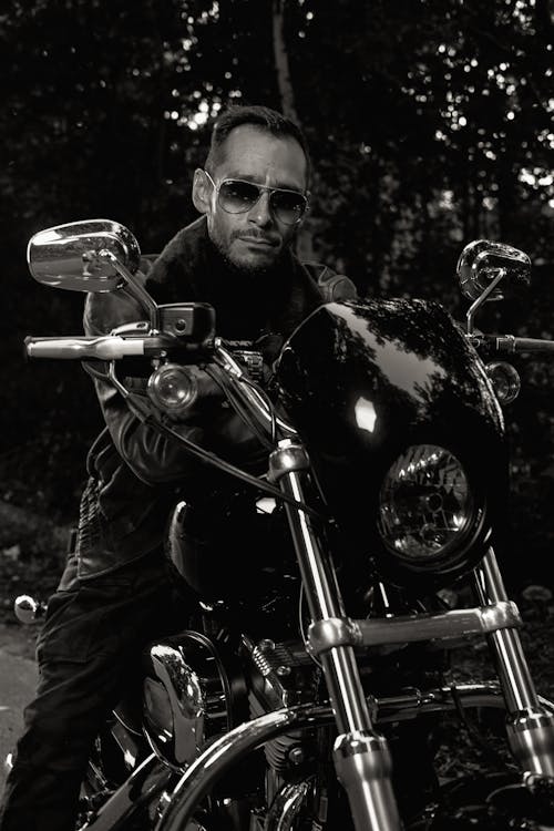A Man Riding a Motorcycle 