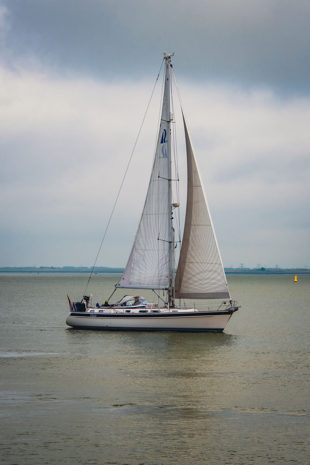 Ela 52 — sailing yacht resting in a calm sea bay