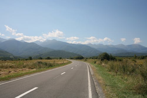 Free A Road Towards the Mountains  Stock Photo