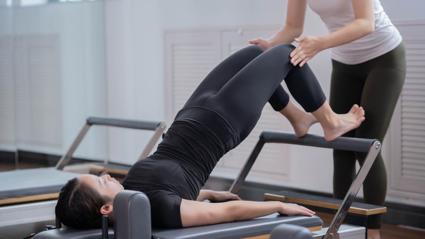 How to Pick a Pilates DVD Without Wasting Money on One You'll Never Finish