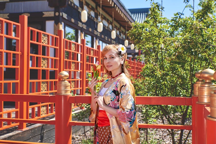 A Woman Wearing A Kimono Robe