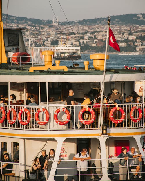 People Riding a Ferry Boat