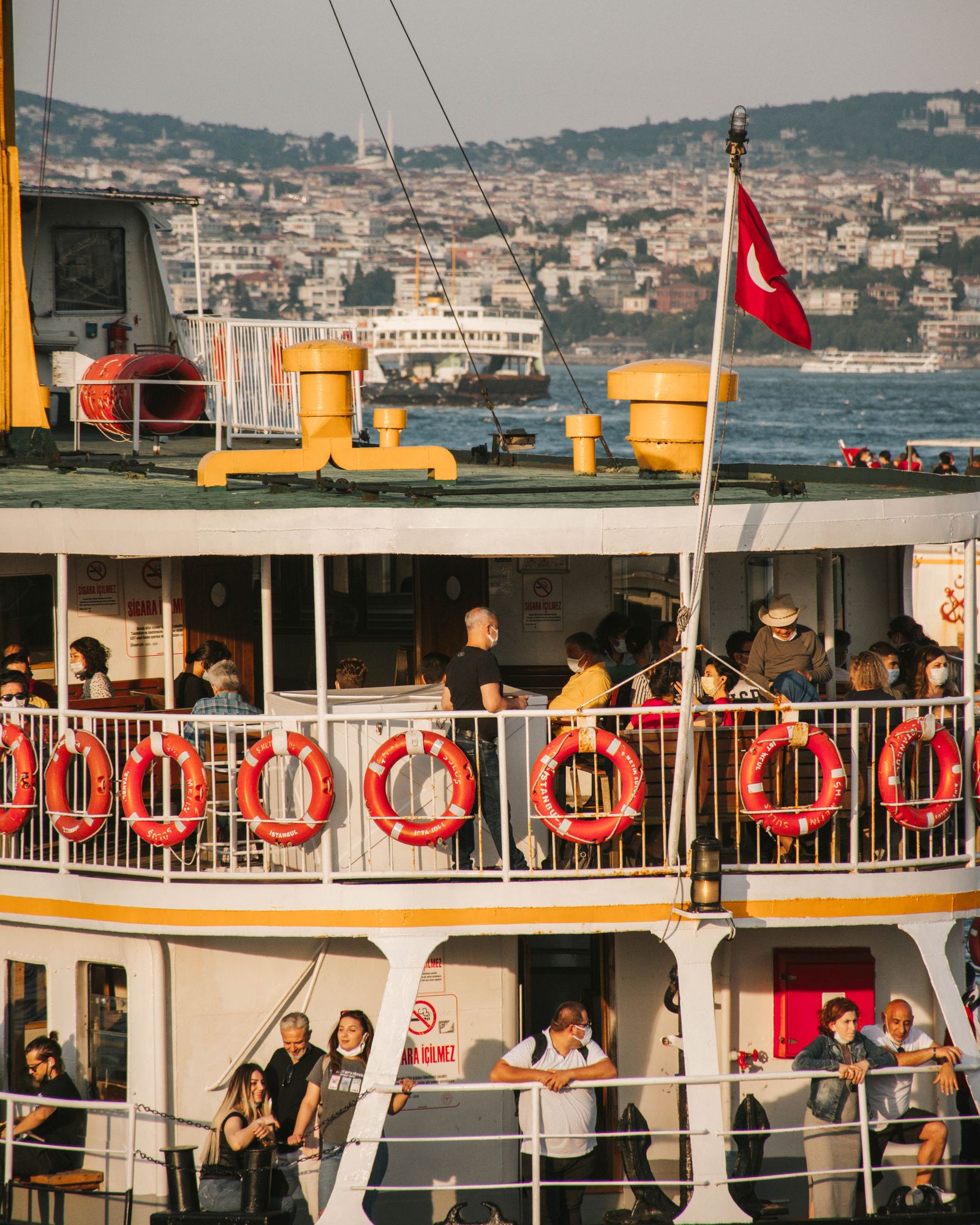 Travellers enjoying an outdoor ferry experience together