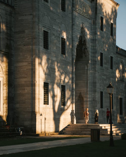 People Standing in Front of a  Building