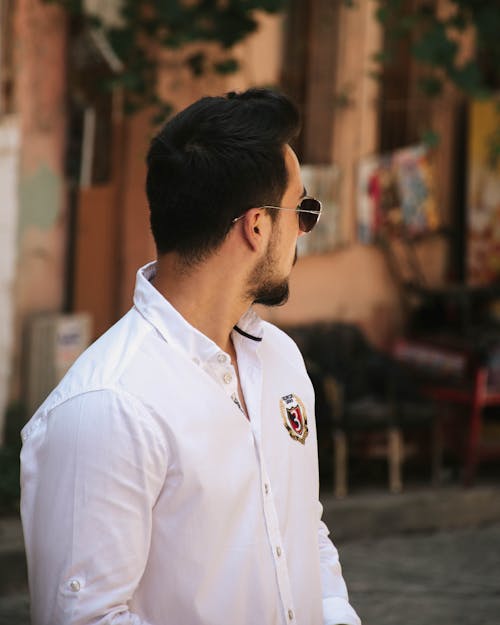 Man in White Button Up Shirt Wearing Black Sunglasses