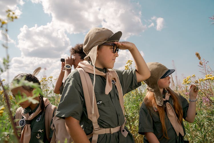 A Group Of Kids Scouting