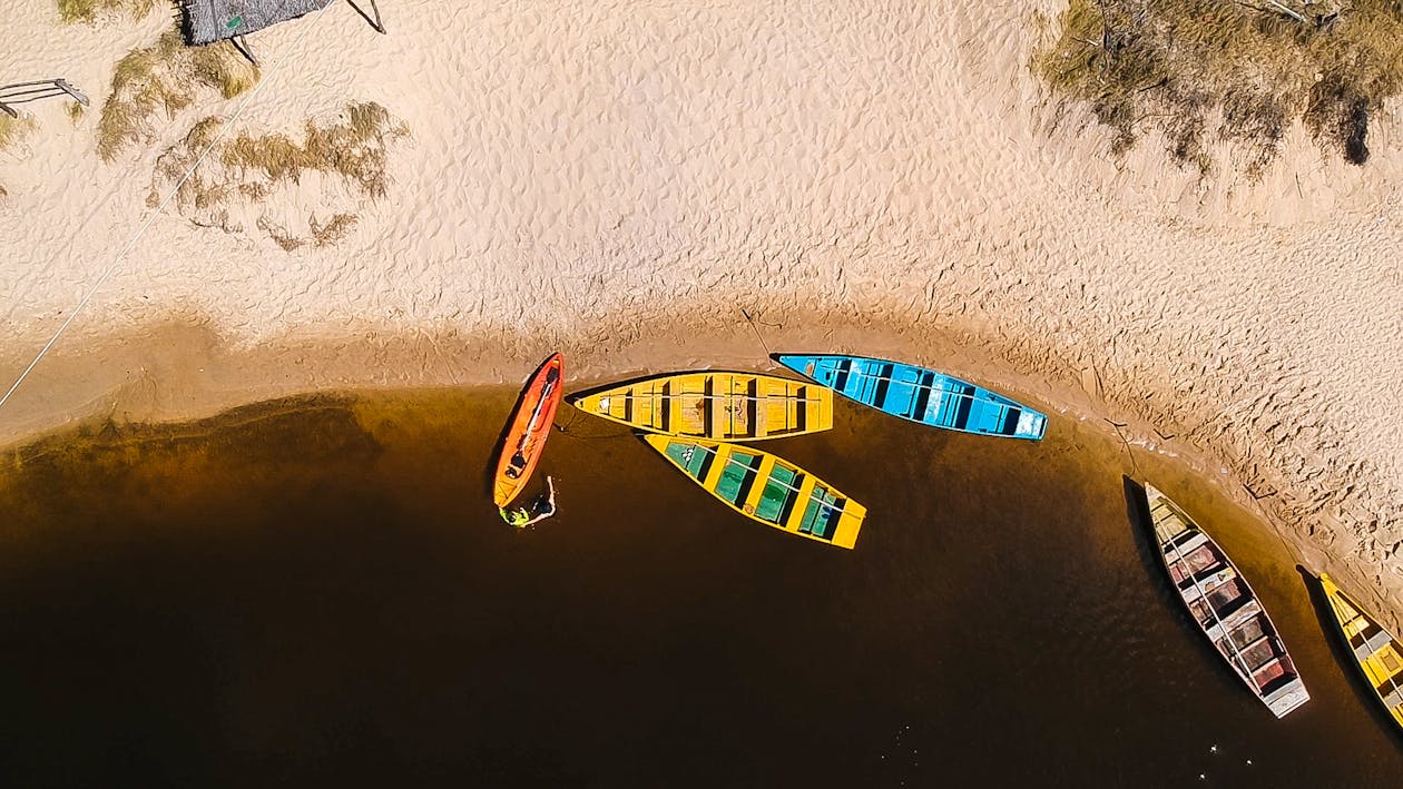 Free Top View of Assorted-colored Row Boats Stock Photo