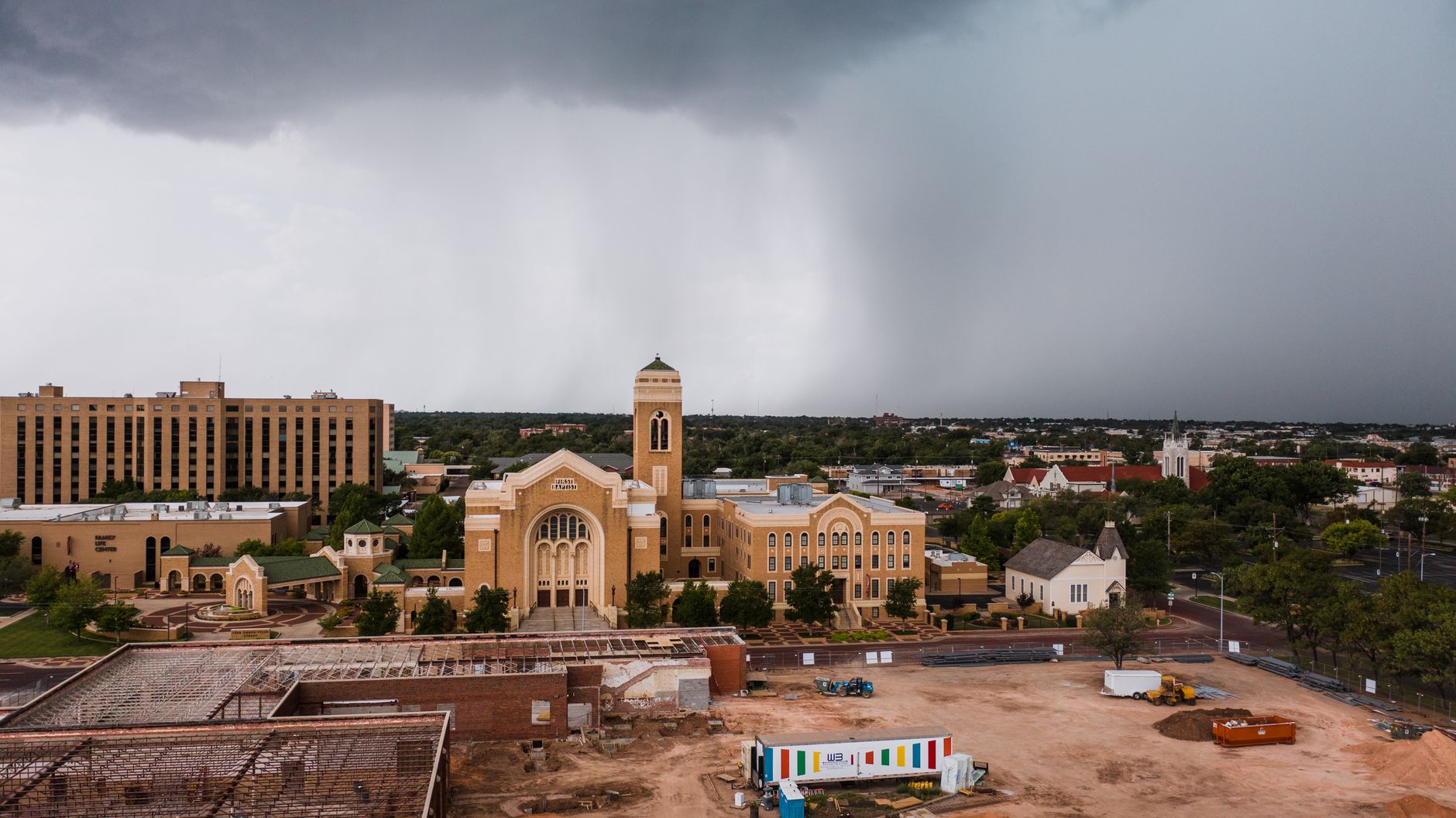 Aerial shot of First Baptist Church in Amarillo, Texas during a rainstorm.