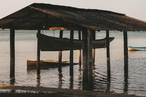 Boat in Hut on Lakeshore