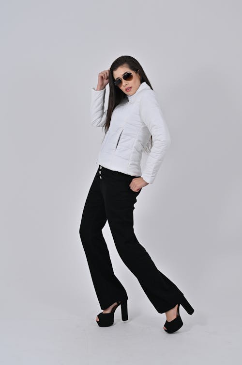 Woman in White Jacket and Black Pants