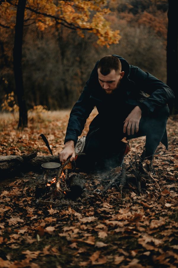 Hot coffee in hands on a chilly camping morning