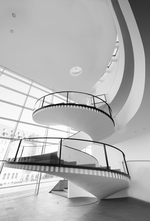 Free Grayscale Photo of Spiral Stairs Stock Photo