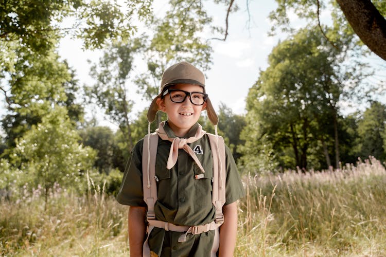 A Boy Wearing His Boy Scout Uniform 