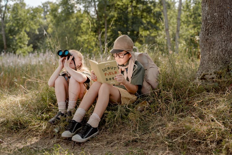 Blonde Girl Looking At The Binoculars 