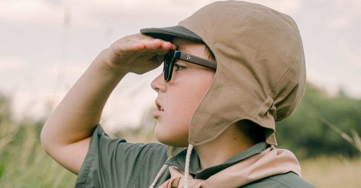 Scouter View Scout in Uniform Looking ahead · Free Stock Photo