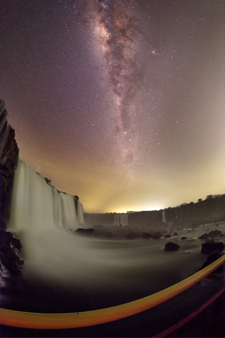 Milky Way Visible Above Waterfall