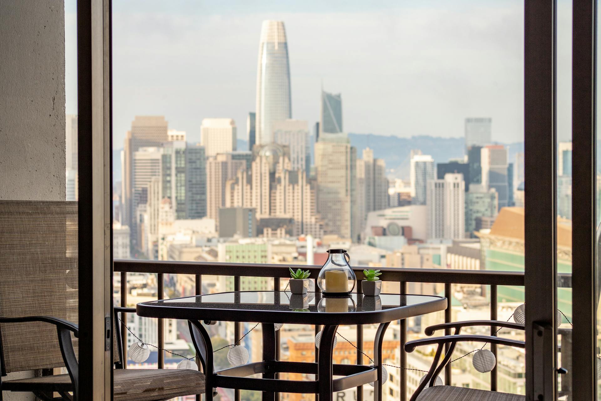 Enjoy a breathtaking view of the San Francisco skyline from a cozy terrace.