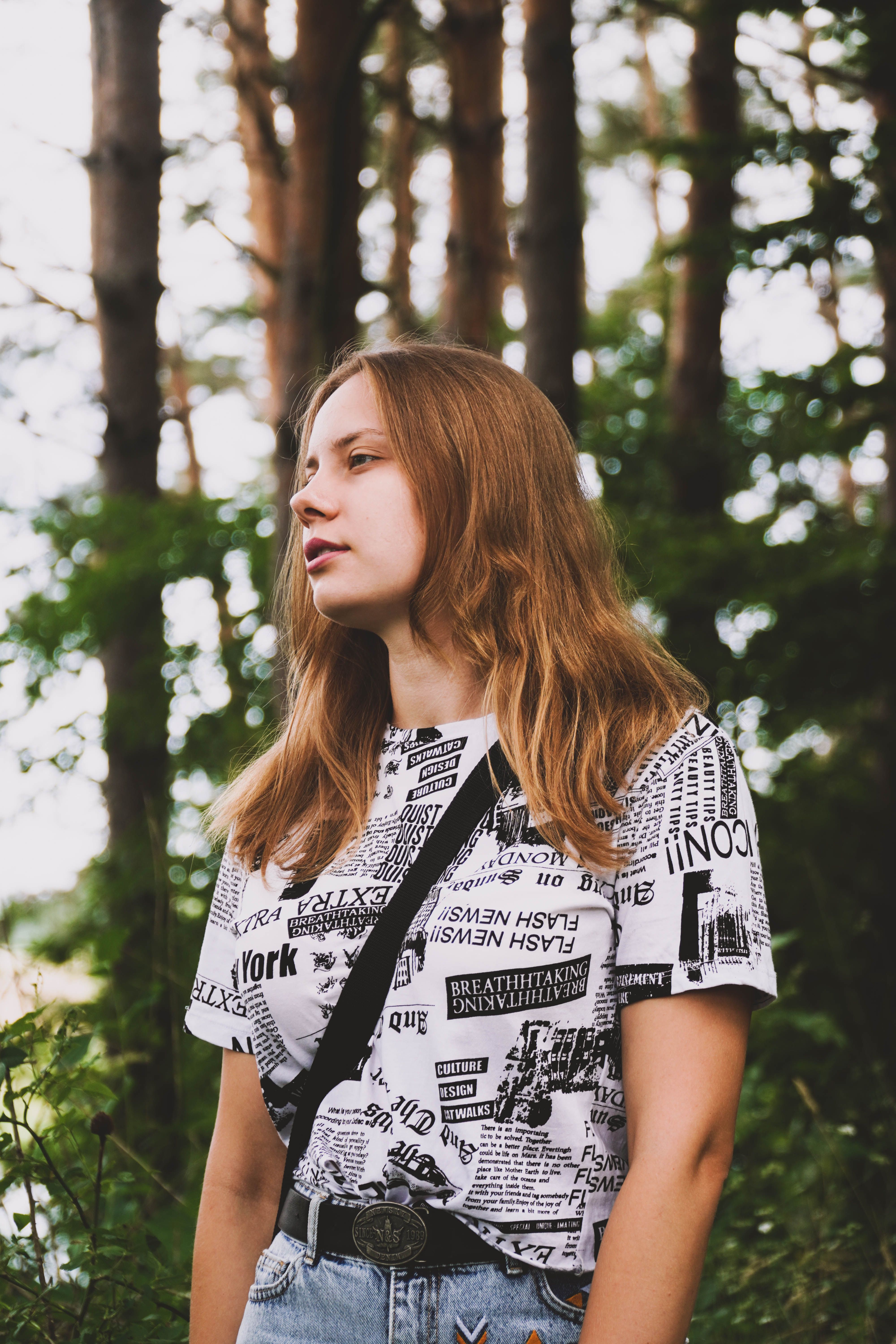 A Portrait of a Woman Wearing a Black and White Shirt · Free Stock Photo