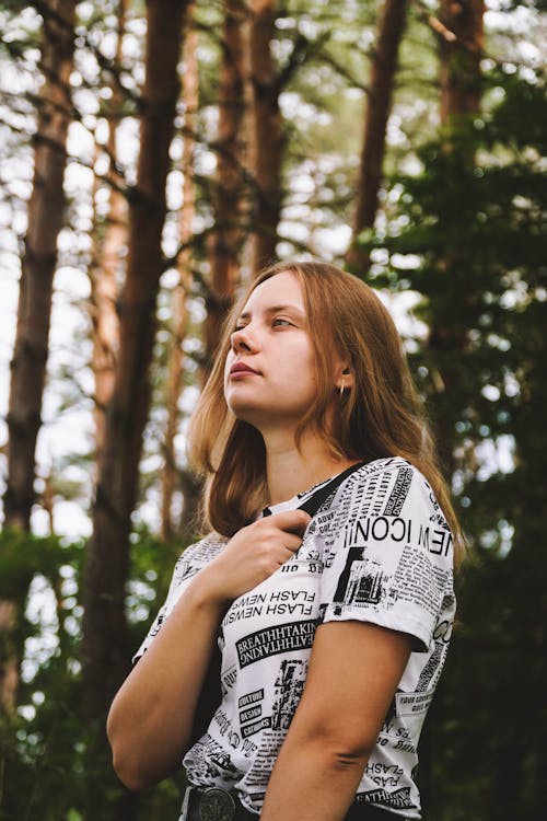 Free Low Angle Shot of Woman in Printed Shirt  Stock Photo