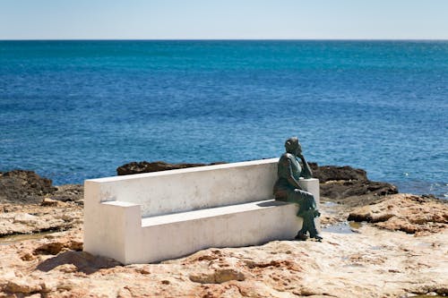 Foto profissional grátis de beira-mar, embora, estátua